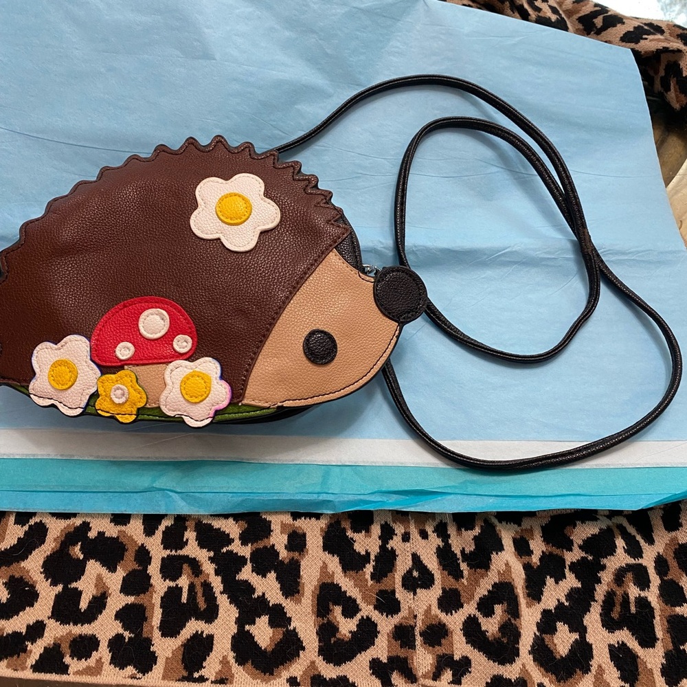 Adorable Hedgehog Kids Bag with Floral Accents